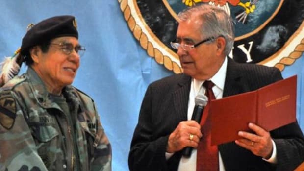 Cherokee artist and veteran Donald Vann was presented a high school diploma from his former Stilwell High School Superintendent Neil Morton 46 years after leaving school to enlist.