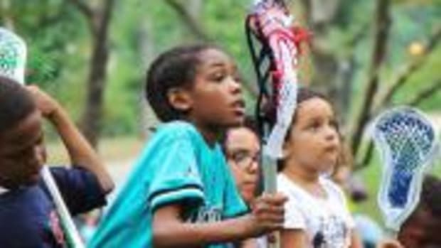 Native American youth from New York City enjoy an afternoon of lacrosse at Central Park as part of a Wings of America camp in July.