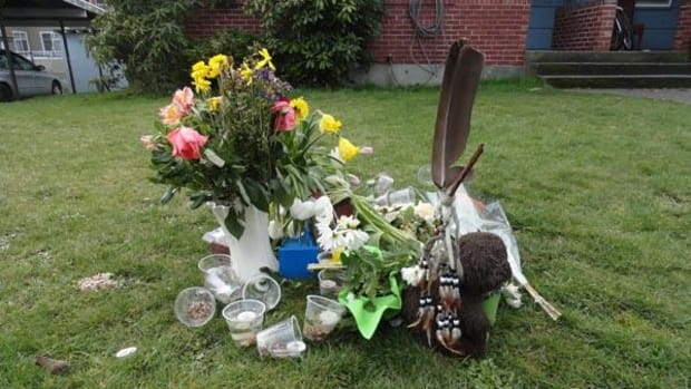 A memorial sits where Jack Keewatinawin, a 21-year-old mentally ill Native man, was fatally shot by the Seattle Police Department following a response to a 911 call, that has a neighborhood raising questions about how the events unfolded.