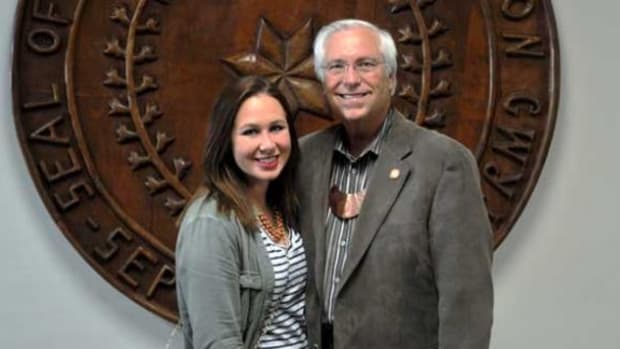 Cherokee Nation citizen Sarah Ferrell was congratulated by Principal Chief Bill John Baker for being recognized as one of 10 All Native American High School Academic Team members for 2014-15.