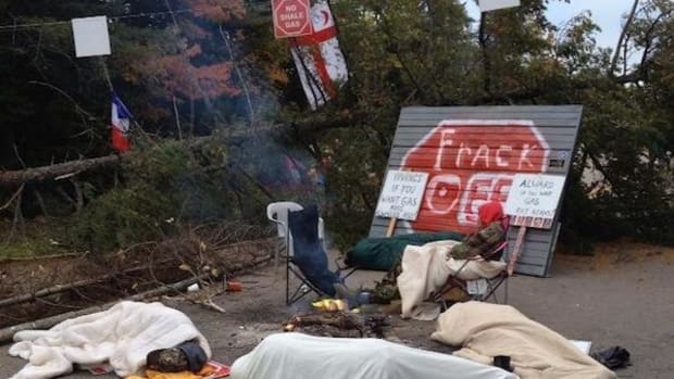 Protesters against fracking in Kent County, New Brunswick, Canada, slept on the ground overnight on September 30 to try and stop SWN Resources Canada from conducting seismic testing for potential fracking.