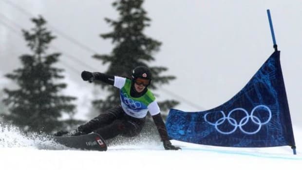 Canada's Caroline Calve, an advocate for the First Nations Snowboard Team, competes during the women's parallel giant slalom snowboard qualifications at the Vancouver Winter Olympics at Cypress Mountain in West Vancouver, B.C., on February 26, 2010. (AP Photo/Darryl Dyck, CP)