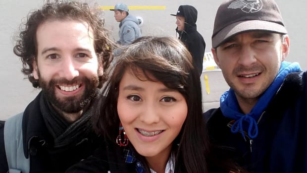 Artist Luke Turner, Red Nation council member Melissa Tso and Actor Shia LaBeouf at the "He Will Not Divide Us" art installation in Albuquerque. Photo Jason Asenap