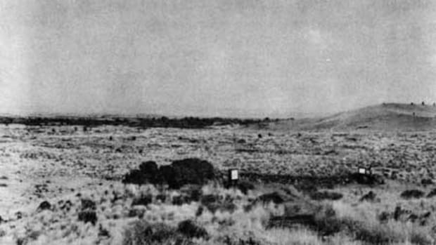 The low-lying area beyond the ranger is the general site where the Captain Evan Thomas’s patrol was so devastatingly attacked by the Modocs. The hill to the right is the butte that was the object of the patrol (today called Hardin Butte).