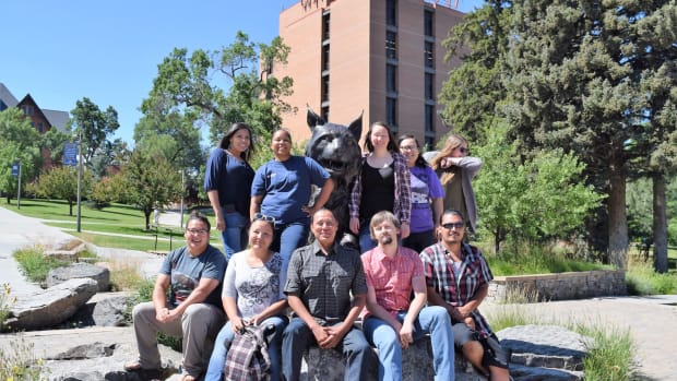 Some of the Native students at Montana State University pose with the university’s mascot, the Bobcat.