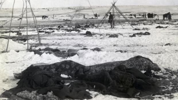 In January 1891, the bodies of four Lakota Sioux are seen wrapped in blankets, three weeks after the December 29 massacre by U.S. forces at Wounded Knee River on the Pine Ridge reservation in South Dakota.