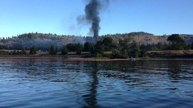 Sixteen cars of a Union Pacific train carrying highly volatile Bakken crude derailed over the weekend, and four caught fire, leaking oil into the Columbia River and prompting evacuations.