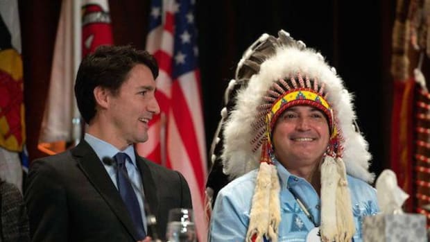 Canadian Prime Minister Justin Trudeau is shown here in sunnier days with Assembly of First Nations National Chief Perry Bellegarde at a gathering on Dec. 8, 2015. When elected in 2015, Trudeau assured Indigenous peoples that "no relationship is more important to me." Trudeau says he's launching an investigation into murdered and missing aboriginal women and girls, stressing the need for a stronger relationship with the country's indigenous communities. In 2021, however, facing a snap election he called to try to win a majority government, his relationship with Indigenous voters is slipping. (Photo by The Canadian Press via AP/File)