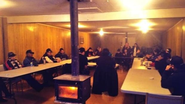 Leadership of the Lubicon Lake Cree Nation meet in their longhouse to discuss the Penn West court order and their anti-fracking blockade.