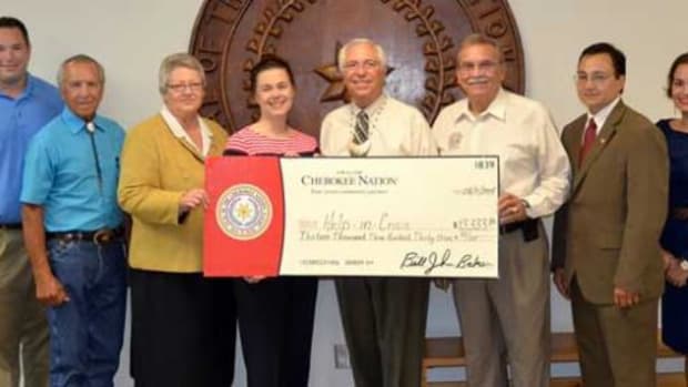 The Cherokee Nation recently donated $80,000 to six domestic violence shelters. Pictured, from left, are Help-In-Crisis Vice Chairman Mike Skinner, Cherokee Nation Tribal Councilor Curtis Snell, Tribal Council Speaker Tina Glory-Jordan, Help-In-Crisis Executive Director Margret Cook, Principal Chief Bill John Baker, Deputy Chief S. Joe Crittenden, Secretary of State Chuck Hoskin Jr. and Treasurer Lacey Horn.