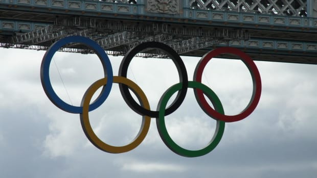 Olympic Rings on the Tower Bridge in London for the 2012 Summer Olympics. (Photo by Dave Catchpole, Creative Commons)