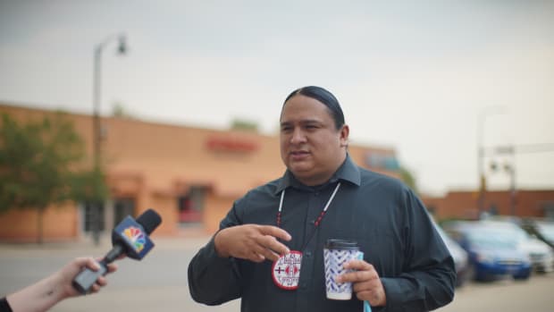 Pictured: NDN Collective President and CEO Nick Tilsen talks to media outside of the NDN Collective headquarters in the hour leading up to his preliminary hearing on Friday morning.