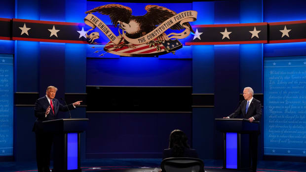 President Donald Trump, left, points towards Democratic presidential candidate former Vice President Joe Biden, right, during the second and final presidential debate Thursday, Oct. 22, 2020, at Belmont University in Nashville, Tenn. Seated in the center is moderator Kristen Welker of NBC News. (AP Photo/Patrick Semansky)