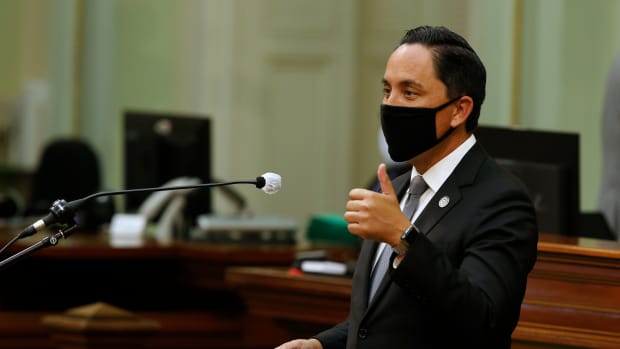In this Monday, June 8, 2020, file photo, Assemblyman Todd Gloria, D-San Diego, gives a thumbs-up as he asks lawmakers to approve his measure to increase mental health funding for the homeless, at the Capitol in Sacramento, Calif. Gloria, a gay state legislator, is a leading contender in the race to become mayor. (AP Photo/Rich Pedroncelli, File)