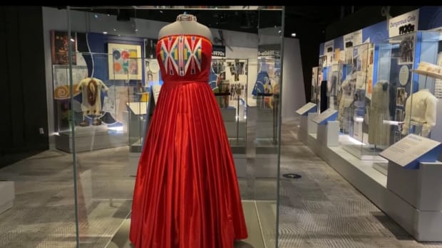 Isabella Aiukli Cornell’s 2018 prom dress is on display in “Girlhood,” a new exhibit at the Smithsonian National Museum of American History. Designer Della Bighair-Stump chose red to bring attention to the peril faced by Indigenous women. (Photo by Emma Sears/Gaylord News)