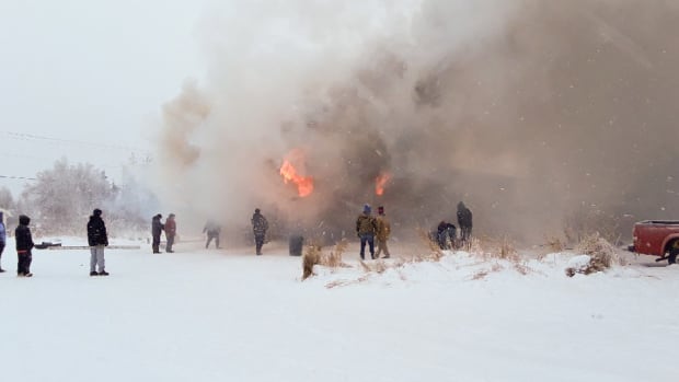 On Jan. 16, a fire broke out in Tuluksak, a western Alaskan village. Locals tried to extinguish the fire, which destroyed the community's only water plant. (Photo by Kristy Napoka, Alaska Public Media)