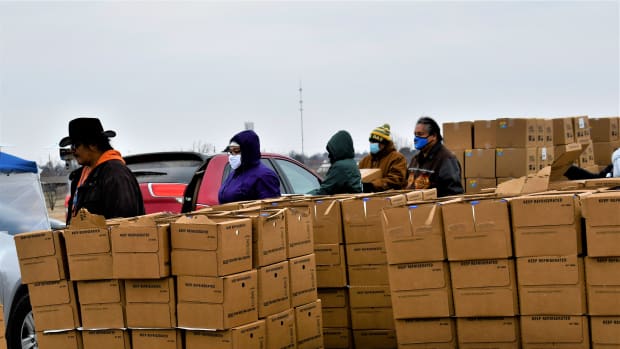 Kiowa volunteers work to provide nearly 45,000 pounds of boxed-up food to tribal members and non-Native members of the community. (Photo by the Kiowa Tribe via Gaylord News)