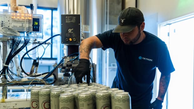A worker at the 3R Brewery cans the Luiseño Hazy IPA. The brewery reopened in late 2020 after a Covid shutdown with its new name and new offerings. (Photo courtesy of Rincon Reservation Road Brewery).