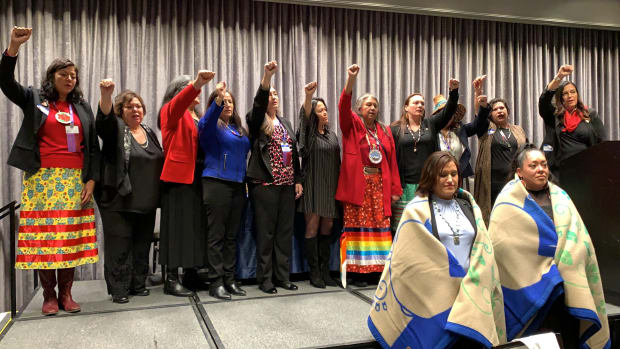 Native women at the 25th National Indian Women’s “Supporting Each Other” Honoring Lunch in Washington, D.C. singing the Women's Honor Song. (Photo by Jourdan Bennett-Begaye)