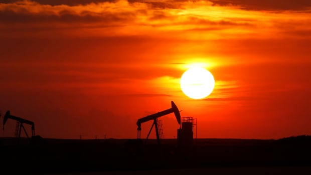 The sun sets behind oilfield pumpjacks in the Bakken Formation in  Williston Basin in North Dakota on Saturday, Sept. 8, 2018. (Photo by Larry MacDougal via AP; file photo)