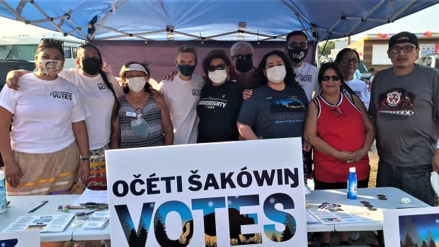 At a powwow on the Crow Creek Sioux Reservation, Native voting rights advocates promoted participation in redistricting. (Photo by Buffalo's Fire)