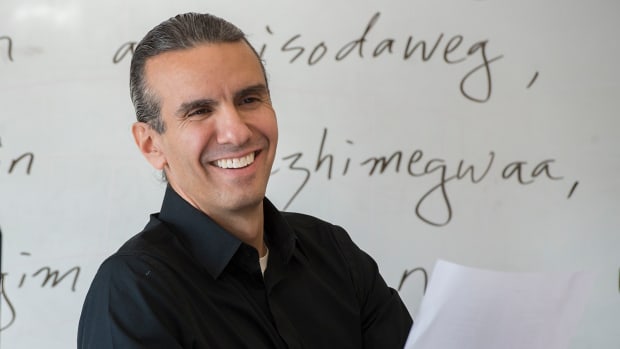 Anton Treuer, an Ojibwe author, speaker and professor, interacts with students while teaching his advanced Ojibwe class at Bemidji State University in Minnesota. Treuer is a leading scholar in preserving and expanding the use of the Ojibwe language. (Photo courtesy of Bemidji State University)