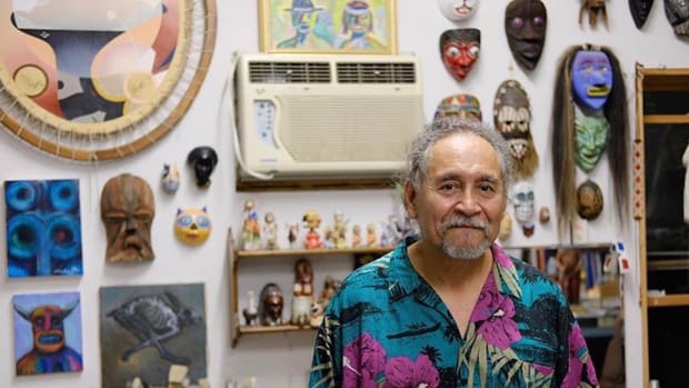 Ojibwe artist Jim Denomie, shown here in his studio, died March 1, 2022, after a brief battle with cancer. (Photo by Joerg Metzner, courtesy of Todd Bockley/Bockley Gallery)
