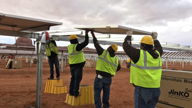 The construction project to build the Kayenta solar farms on the Navajo Nation, shown here in 2018, employed hundreds of people, nearly 90 percent of whom were Navajo citizens. Renewable energy is drawing increasing attention from tribes and others as a way to build jobs for the future. (Photo courtesy of the Navajo Tribal Utility Authority/Navajo Nation)
