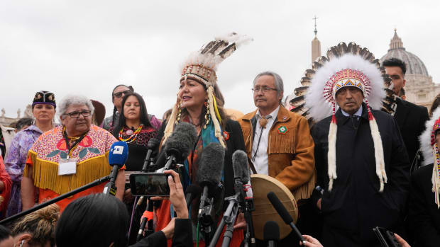 Assembly of First Nations member Rosanne Casimiro Ttes talks to journalists outside St. Peter's Square at the end of a meeting with Pope Francis at the Vatican, Thursday, March 31, 2022. (AP Photo/Andrew Medichini)