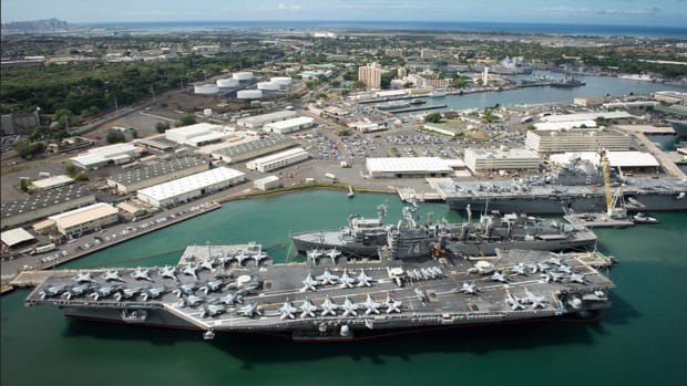 JOINT BASE PEARL HARBOR-HICKAM (July 6, 2016) - An aerial view of ships moored at Joint Base Pearl Harbor-Hickam for Rim of the Pacific 2016. Twenty-six nations, more than 40 ships and submarines, more than 200 aircraft, and 25,000 personnel are participating in RIMPAC from June 30 to Aug. 4, in and around the Hawaiian Islands and Southern California. The world's largest international maritime exercise, RIMPAC provides a unique training opportunity that helps participants foster and sustain the cooperative relationships that are critical to ensuring the safety of sea lanes and security on the world's oceans. RIMPAC 2016 is the 25th exercise in the series that began in 1971. (U.S. Navy Combat Camera photo by Mass Communication Specialist First Class Ace Rheaume/Released) 160706-N-SI773-499