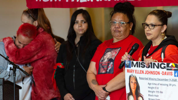 Victim’s advocate and Tulalip Police Department Program Manager Alyshia Ramon, right, with the family of missing Tulalip Tribal member Mary Ellen Johnson-Davis at the National Day for Awareness and Healing for Missing and Murdered Indigenous Women, People and Families Saturday, May 7, 2022, at Daybreak Star Indian Cultural Center in Seattle. Ramon shared that her job is to act as a liaison between victims’ families in law enforcement and hopes other law enforcement agencies will follow the Tulalip Tribes’ examples. (Photo by The Bellingham Herald)