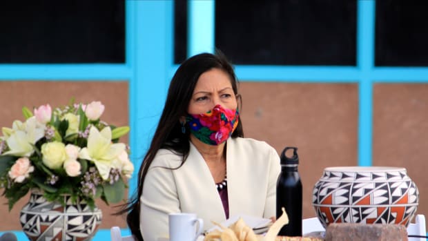 U.S. Interior Secretary Deb Haaland listens to tribal leaders during a round-table discussion at the Indian Pueblo Cultural Center in Albuquerque, New Mexico, on Tuesday, April 6, 2021. The visit marked Haaland's first to her home state after being confirmed as head of the federal agency, making her the first Native American to hold a Cabinet position. (AP Photo/Susan Montoya Bryan)