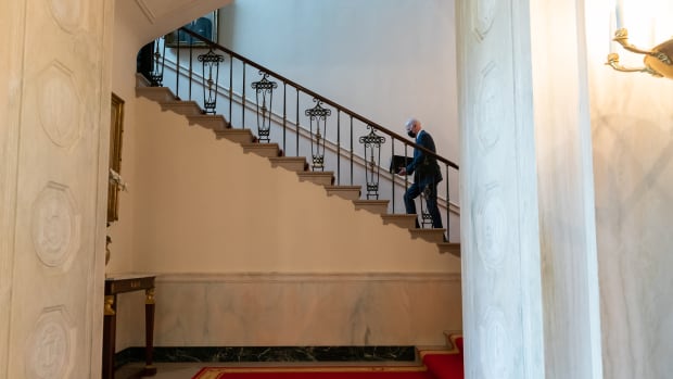 President Joe Biden walks up the Grand Staircase of the White House on Monday, April 5, 2021, to the Second Floor private residence. (Official White House Photo by Adam Schultz)
