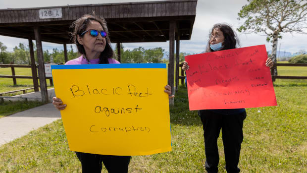 Marietta Green, left, and Leona Gopher protest outside the Blackfeet administration building in Browning, Montana. Protesters demand transparency in accounting for how federal COVID-19 relief funds were spent. (Photo by Beth Wallis/News21)
