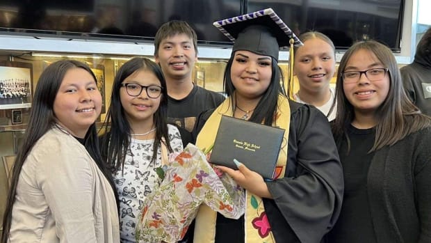 Sherraine White, far left, Mille Lacs Band of Ojibwe, is now the matriarch of her family at age 23 after the loss of her mother, grandmother and other family members in the last few years. She is shown here at the graduation of her sister, Valerie Mitchell, with siblings, from left, Aniyah White, Matthew Mitchell, Waylon Mitchell, and Jayenissa Mitchell. (Photo courtesy of Sherraine White)