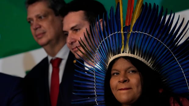 Brazil's newly-named Minister of Indigenous Peoples Sonia Guajajara attends a meeting where Brazil's President-elect Luiz Inacio Lula da Silva announced the ministers for his incoming government, in Brasilia, Brazil, on Dec. 29, 2022. Lula was sworn-in on Jan. 1, 2023. (AP Photo/Eraldo Peres)
