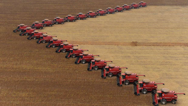 Workers on tractors harvest soybeans in this file photo from March 5, 2009, in Campo Novo do Parecis in Mato Grosso, one of Brazil's largest agricultural areas. Brazil is the world's second largest soy producer after the United States and the crop is one of the nation's principal exports. (AP Photo/Maurilio Cheli)