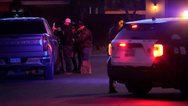 Las Vegas police work near the home of former actor Nathan Lee Chasing His Horse, who goes by Nathan Chasing Horse, Tuesday, Jan. 31, 2023, in North Las Vegas, Nev. Authorities raided the home of the former actor Tuesday in connection with a sexual assault investigation. (AP Photo/John Locher)