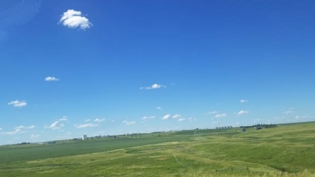 A scene typical of Lyman County, South Dakota illustrates its sparsely settled nature, with a population of 3,718 spread across more than 1,700 square miles, an area larger than the state of Rhode Island. (Phot credit by Talli Nauman)