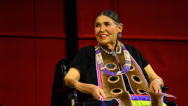 Actress/activist and traditional medicine expert Sacheen Littlefeather received a public apology in person at "An Evening with Sacheen Littlefeather," at the Academy Museum of Motion Pictures on Sept. 17, 2022, shown here, for the treatment she received after refusing an Oscar on behalf of actor Marlon Brando in 1973 in protest of the way Native people were treated in the film industry. She died Oct. 2, 2022, just two weeks later, of metastasized breast cancer. (Photo courtesy of the Academy Museum Foundation)