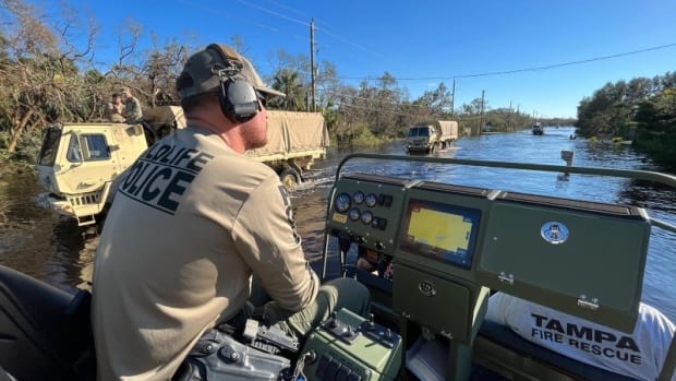 Miccosukee Wildlife Officer Rusty Lacy drives an airboat in the Naples, Florida, area to help with search-and-rescue after Hurricane Ian made landfall near Fort Myers, Florida, on Sept. 28, 2022. The Miccosukee Tribe did not have severe damage in the storm and sent in tribal police and wildlife officers with airboats to help with recovery in Naples and Everglades City. (Photo courtesy of Curtis Osceola)