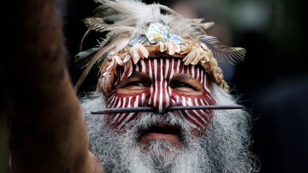 Aboriginal Ngarrindjeri elder Major Sumner, shown here in a 2009 photo in traditional regalia, welcomes the return of Australian Indigenous peoples remains from London. Sumner was recognized for lifetime achievement and inducted into the South Australian Environment Hall of Fame in October 2022 for his work.  (AP Photo/Lefteris Pitarakis)