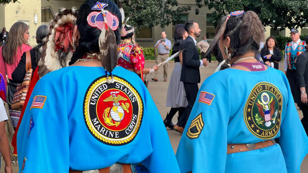 Native women dancing at the Native American Heritage Month event in the Pentagon in Arlington, Virginia, on November 10, 2022. Nearly 20 percent of service women are American Indian and Alaska Native. Indigenous women serve at the highest per capita rate of any other groups. The national average of women serving is 15 percent, said Richard G. Kidd, deputy assistant secretary of defense for environment and energy resilience. (Jourdan Bennett-Begaye, ICT)