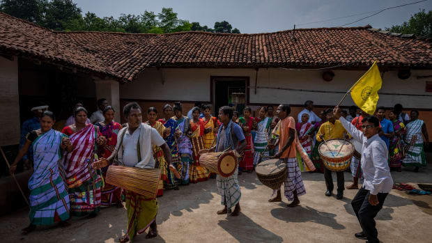 Tribespeople perform an indigenous folk dance in village Guduta, in the eastern Indian state of Odisha, Oct. 20, 2022. India's 110 million indigenous tribespeople scattered across various states and fragmented into hundreds of clans, with different legends, different languages and different words for their gods adhere to Sarna Dharma - a faith not officially recognized by the government. It is a belief system that shares common threads with the world's many ancient nature-worshipping religions. (AP Photo/Altaf Qadri)
