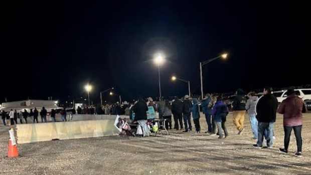 Voters stand outside a polling site in Chinle, Arizona, on Nov.. 5, 2024. Voters stood in long lines after numerous problems delayed voting. (Photo courtesy of Teaira Francis)