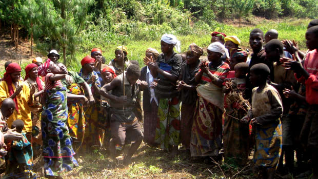 This 2009 photo shows the Indigenous Batwa people performing a traditional dance. The Batwa people have faced violence since the 1970s over efforts to force them to leave their ancestral lands in the Kahuzi-Biega National Park in the Democratic Republic of the Congo. (Photo by Jane Boles via Creative Commons)