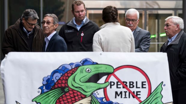 Opponents to the Pebble Mine project make statements outside the federal courthouse in Anchorage, Alaska, on Oct. 8, 2019. Shown are, from left, Bristol Bay Reserve Association Board member Mike LaRussa, Bristol Bay Native Association President/CEO Ralph Andersen, Bristol Bay Regional Seafood Development Association Executive Director Andy Wink, United Tribes of Bristol Bay Deputy Director Lindsay Layland, Bristol Bay Economic Development Corporation President and CEO Norm Van Vactor, and Robin Samuelson of Bristol Bay Native Corporation, make statements at the Federal Courthouse in Anchorage, Alaska. A proposed gold and copper mine at the headwaters of the world's largest sockeye salmon fishery in Alaska would cause "unavoidable adverse impacts," the U.S. Army Corps of Engineers said in a letter to the developer released Monday, Aug. 24, 2020. The corps is asking the backers of Pebble Mine to come up with a mitigation plan within 90 days for nearly 3,000 acres of land and nearly 200 miles of streams it says could be affected if the controversial mine moves forward. (Marc Lester/Anchorage Daily News via AP, File)