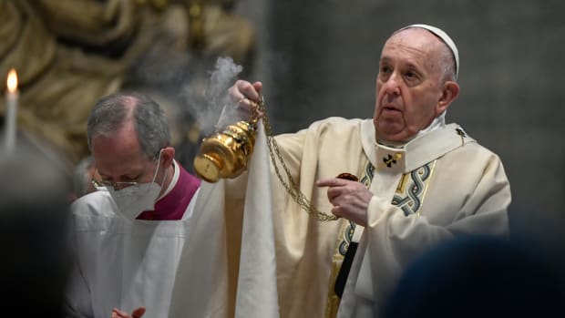 Pope Francis celebrates Easter Mass at St. Peter's Basilica at The Vatican Sunday, April 4, 2021, during the Covid-19 coronavirus pandemic. (Filippo Monteforte/Pool photo via AP)