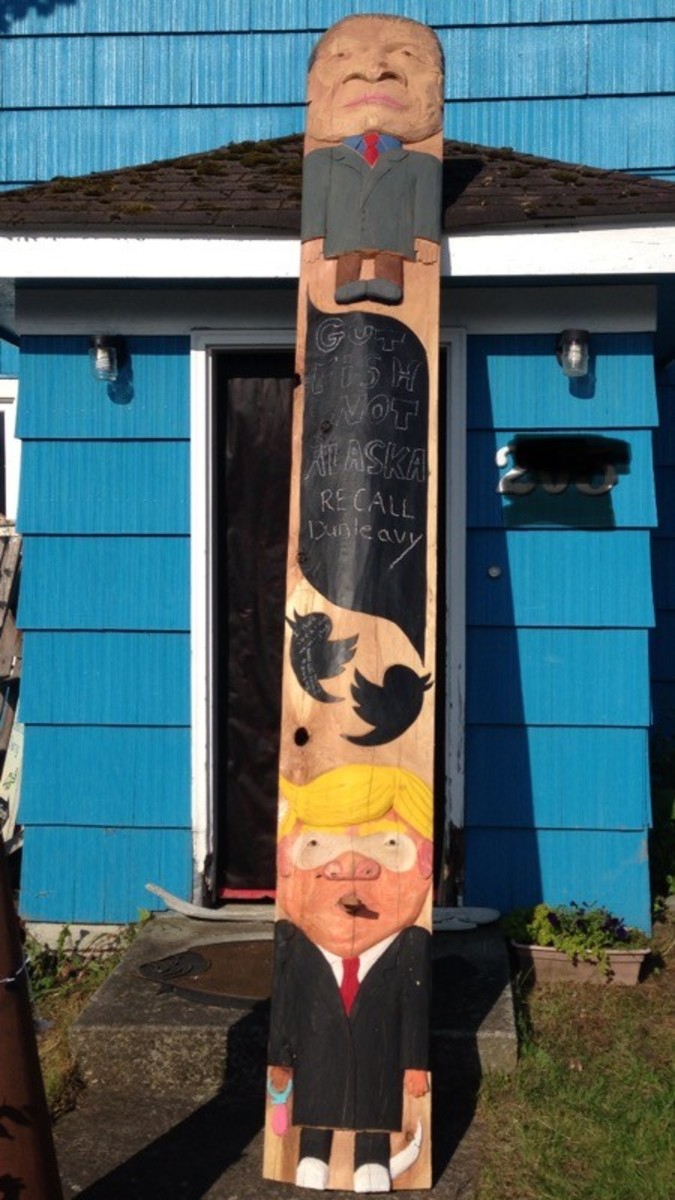 Tlingit carvers create ‘Shaming Totem’ of Trump and Alaska Governor