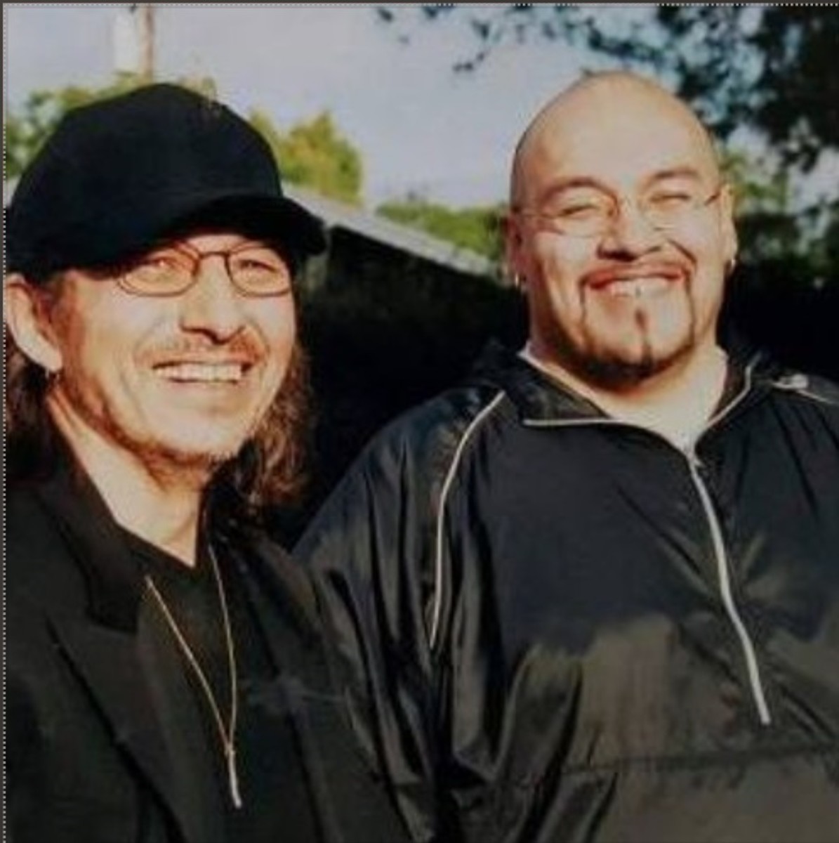 Indigenous artist Wovoka Trudell, Santee Dakota, is shown here with his father, political activist, musician and poet John Trudell, in December 2002. John Trudell, who was spokesman for the occupation of Alcatraz starting in 1969 and later became a leader in the American Indian Movement, died on Dec. 8, 2015 at age 69. (Photo courtesy of Wovoka Trudell)